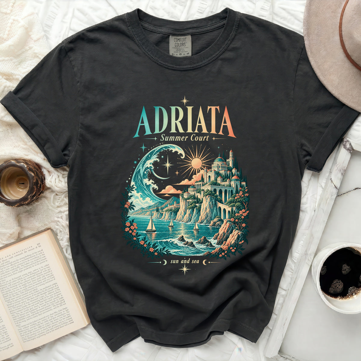 Dark t-shirt with "Adriata Summer Court" graphic featuring a coastal landscape.