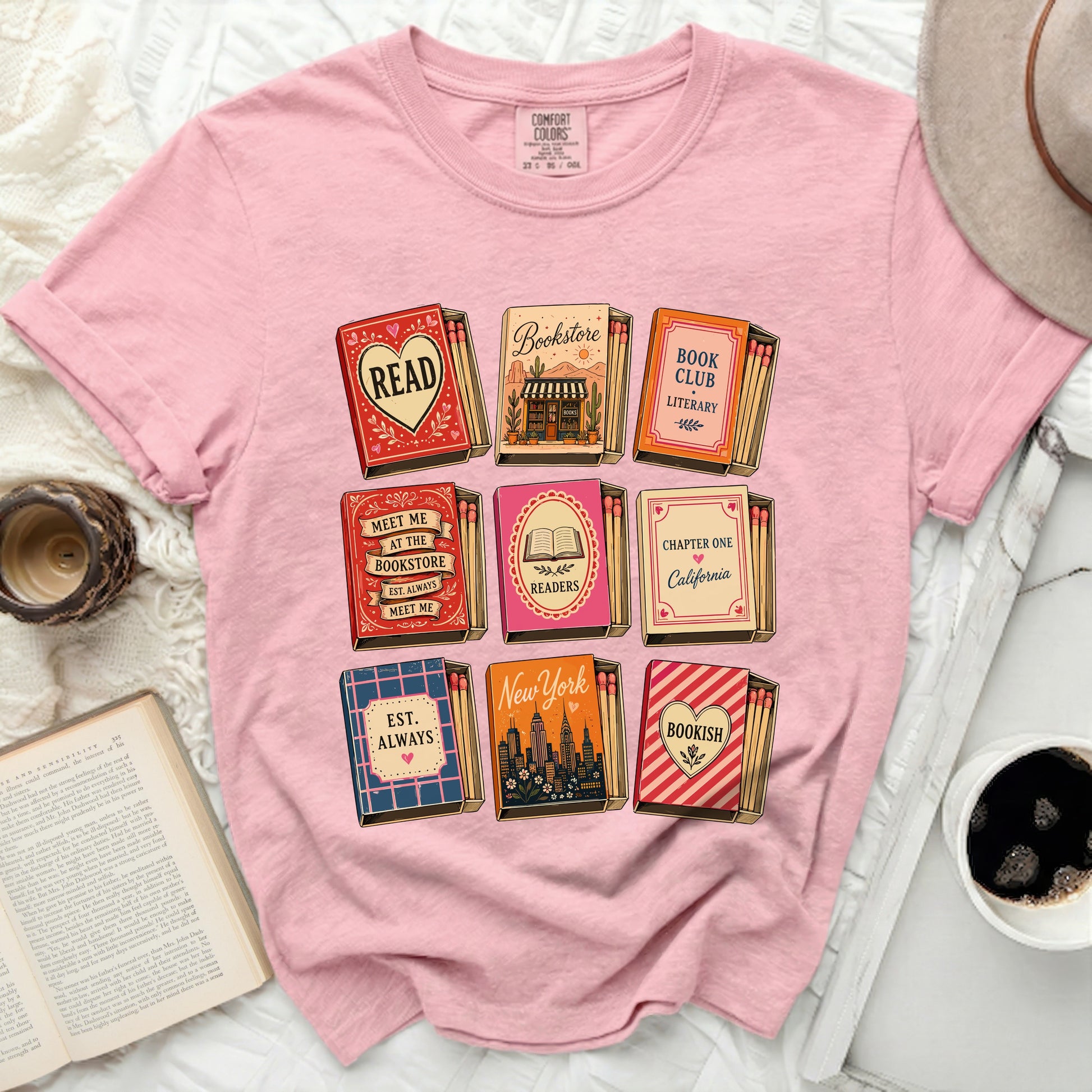 Pink t-shirt with matchbook designs featuring book titles and "Bookstore"
