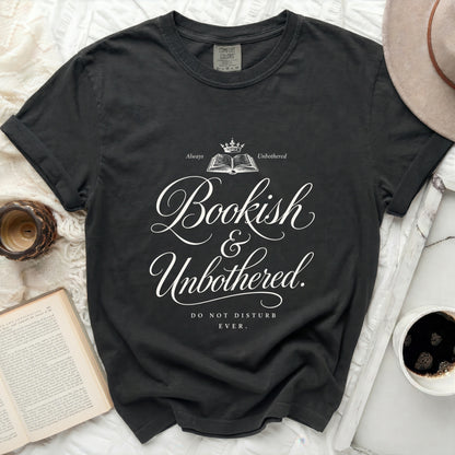 Dark t-shirt with "Bookish & Unbothered. DO NOT DISTURB EVER." text.