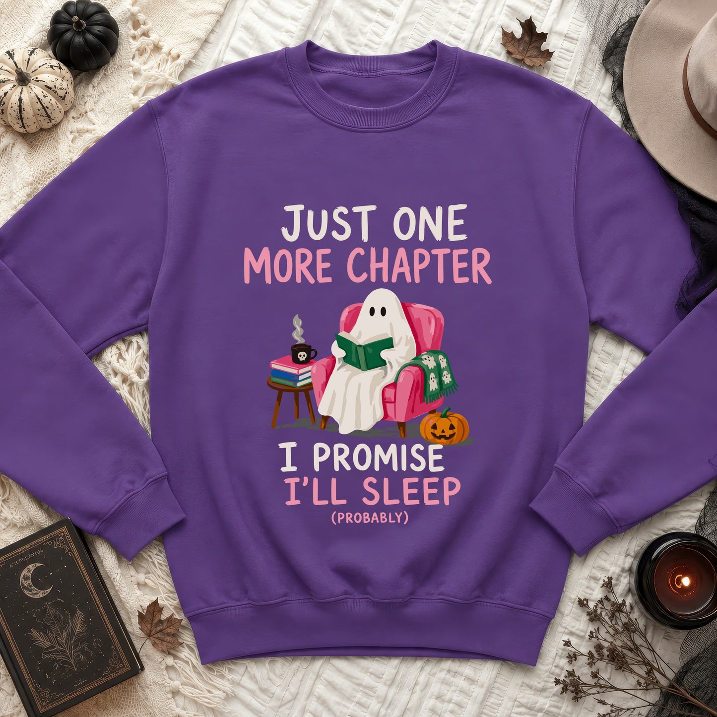 Purple sweatshirt with a ghost reading, "Just One More Chapter, I Promise I'll Sleep (Probably)".