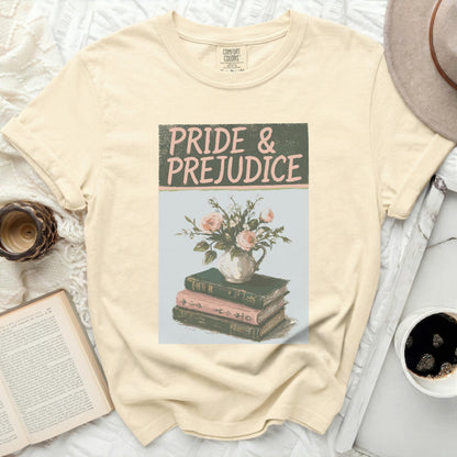 Cream t-shirt with "Pride & Prejudice" title above floral books.