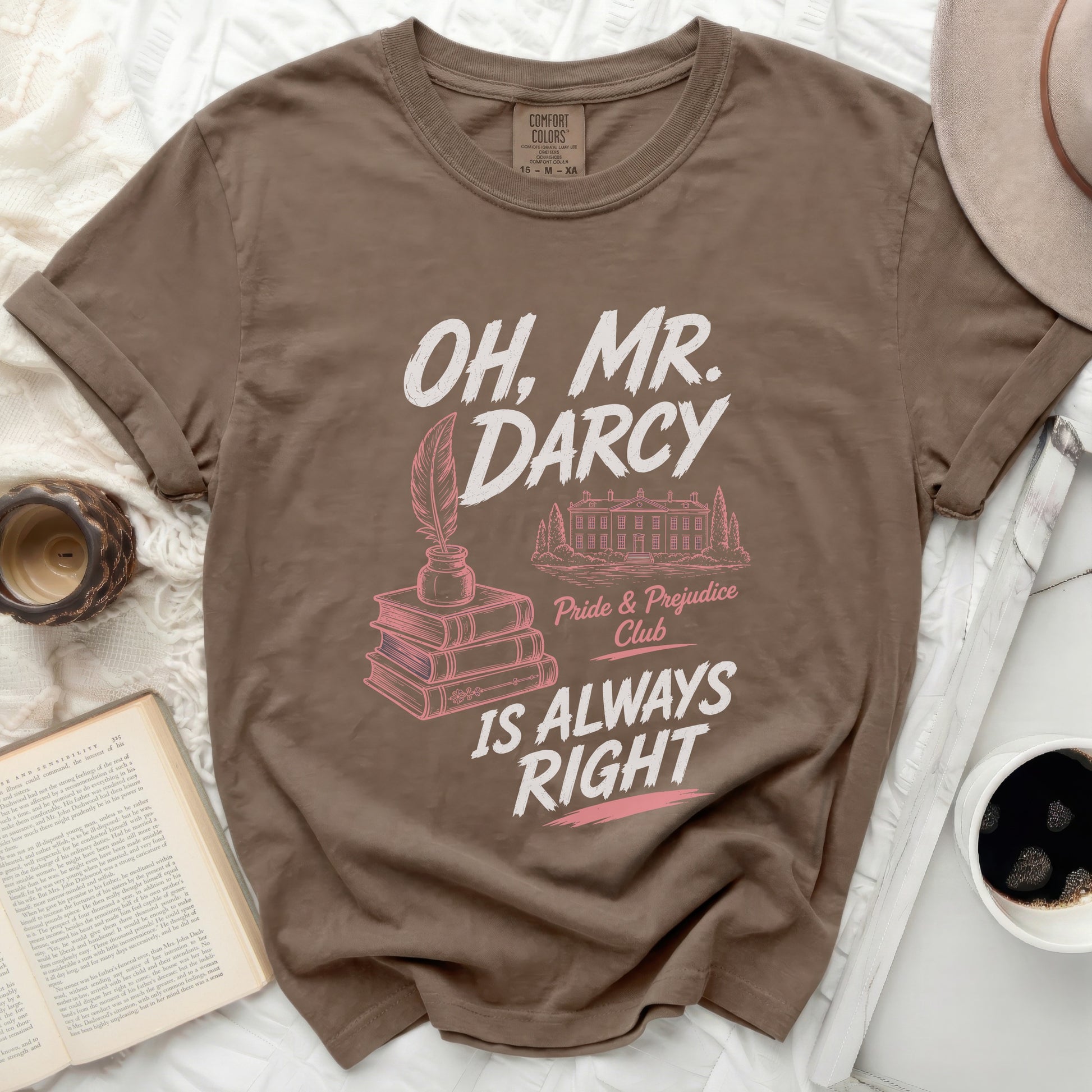 Brown Comfort Colors t-shirt with "Oh, Mr. Darcy Is Always Right" Pride & Prejudice Club graphic.
