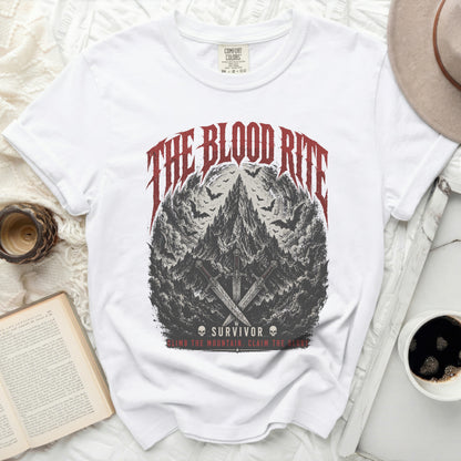 White t-shirt with "The Blood Rite Survivor" graphic and swords.
