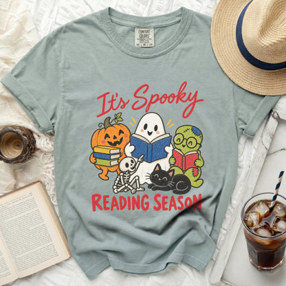 Green t-shirt with "It's Spooky Reading Season" and Halloween characters.