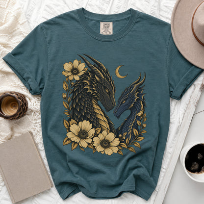 Teal t-shirt with a dragon and flower graphic, featuring a crescent moon.