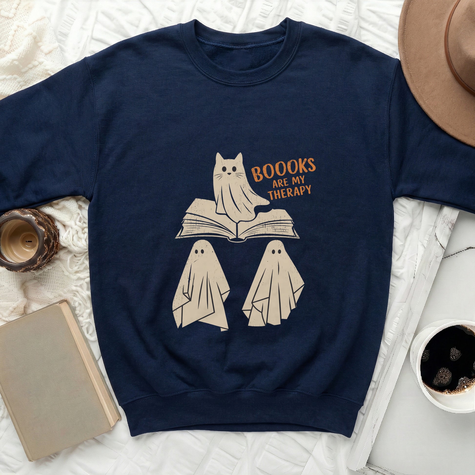 Navy sweatshirt with "BOOOKS ARE MY THERAPY" text featuring a cat ghost and two smaller ghosts.