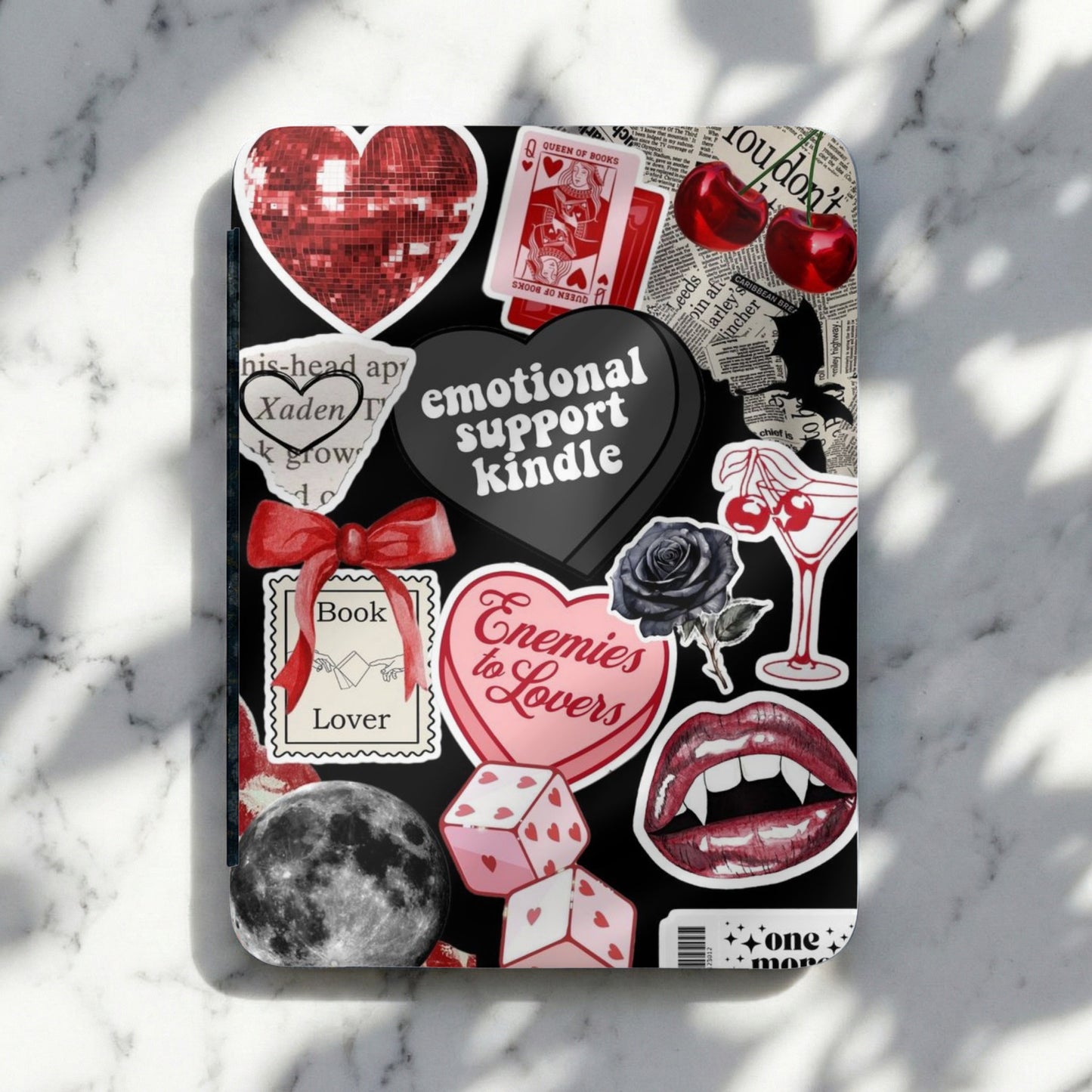 Collage of stickers including text "emotional support kindle" and "Enemies to Lovers."