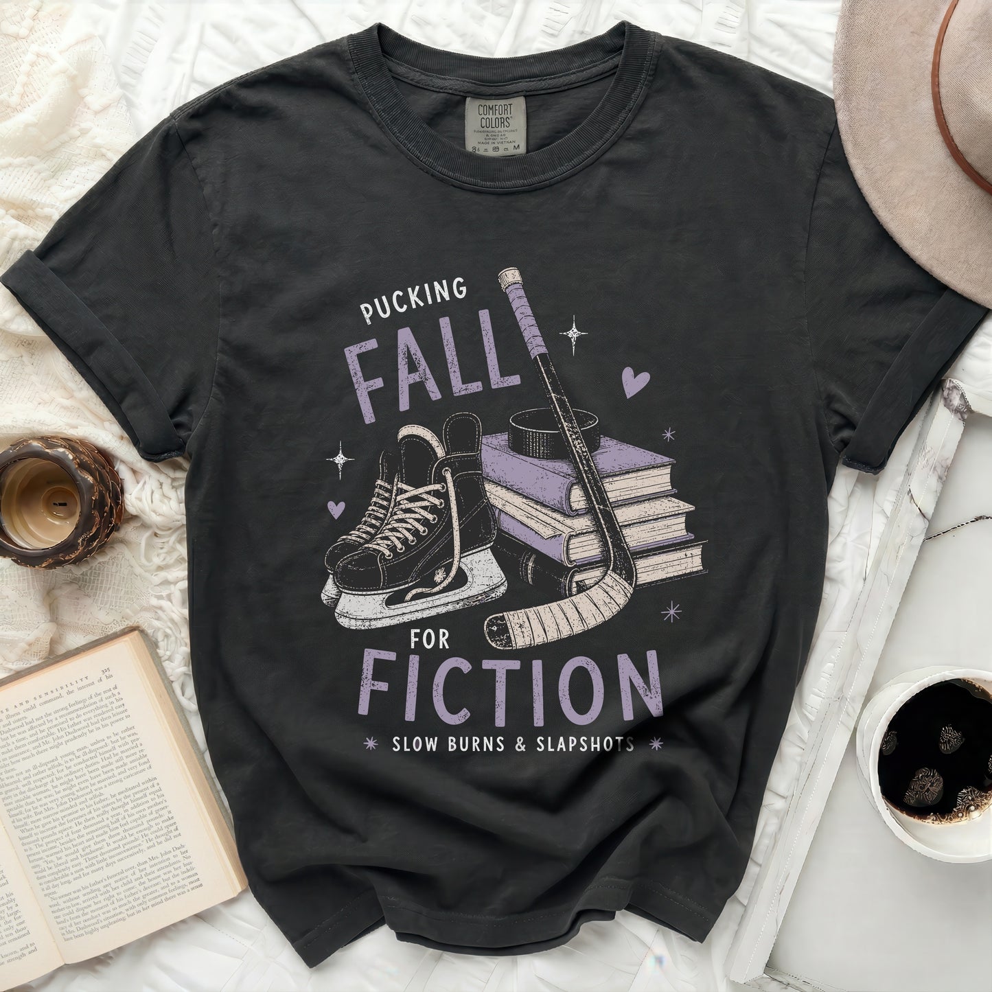 Black t-shirt with "Pucking Fall Fiction" and hockey imagery.
