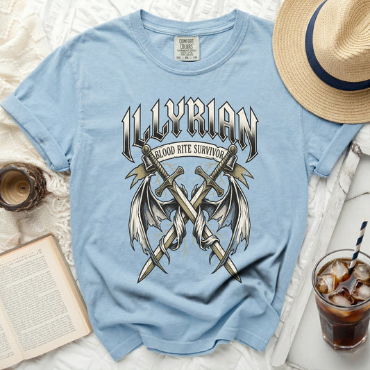 Light blue t-shirt with "ILLYRIAN BLOOD RITE SURVIVOR" graphic.