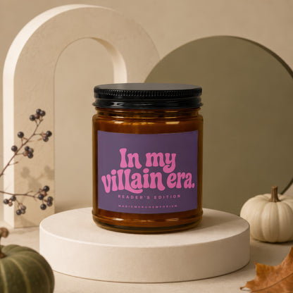 Amber jar candle labeled "In my villain era. Reader's Edition."