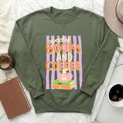 Green sweatshirt with "spooky books and coffee" text and Halloween graphics.