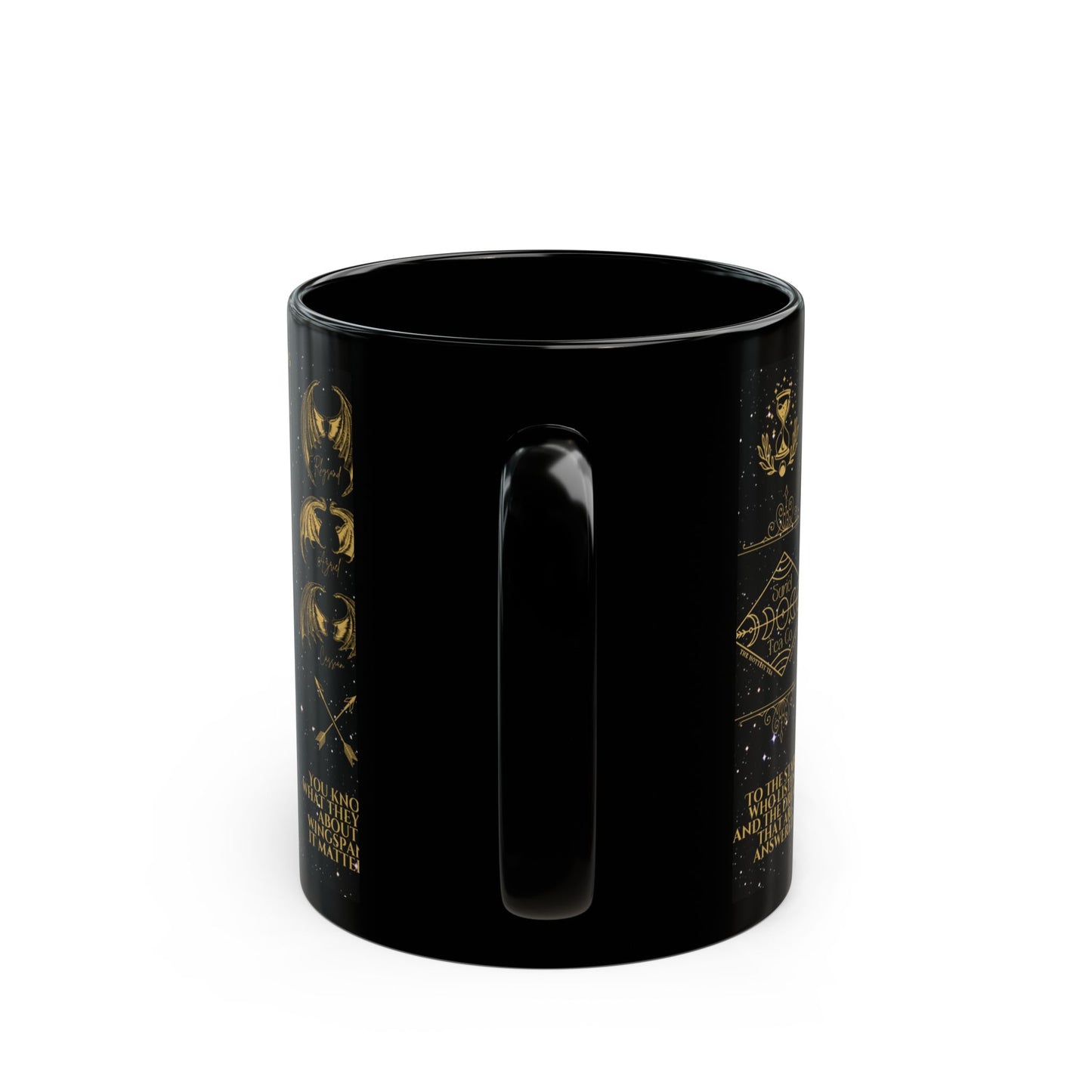 a black coffee mug with gold designs on it