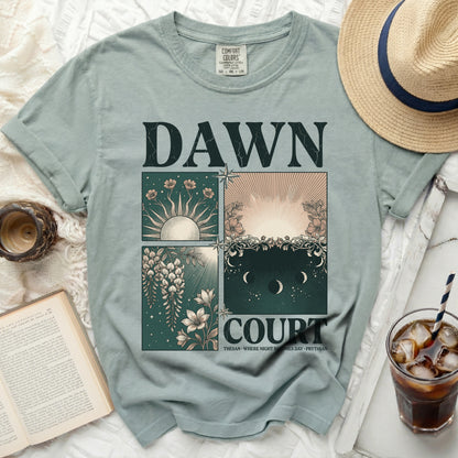 Green comfort colors t-shirt with "DAWN COURT" and celestial art.
