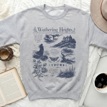 Gray sweatshirt with Wuthering Heights graphic featuring text, castle, moon, and figures.