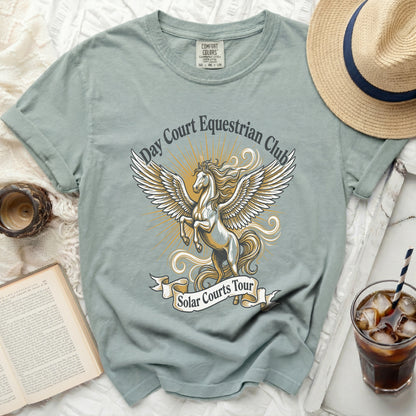 T-shirt with winged horse graphic and text "Day Court Equestrian Club Solar Courts Tour".