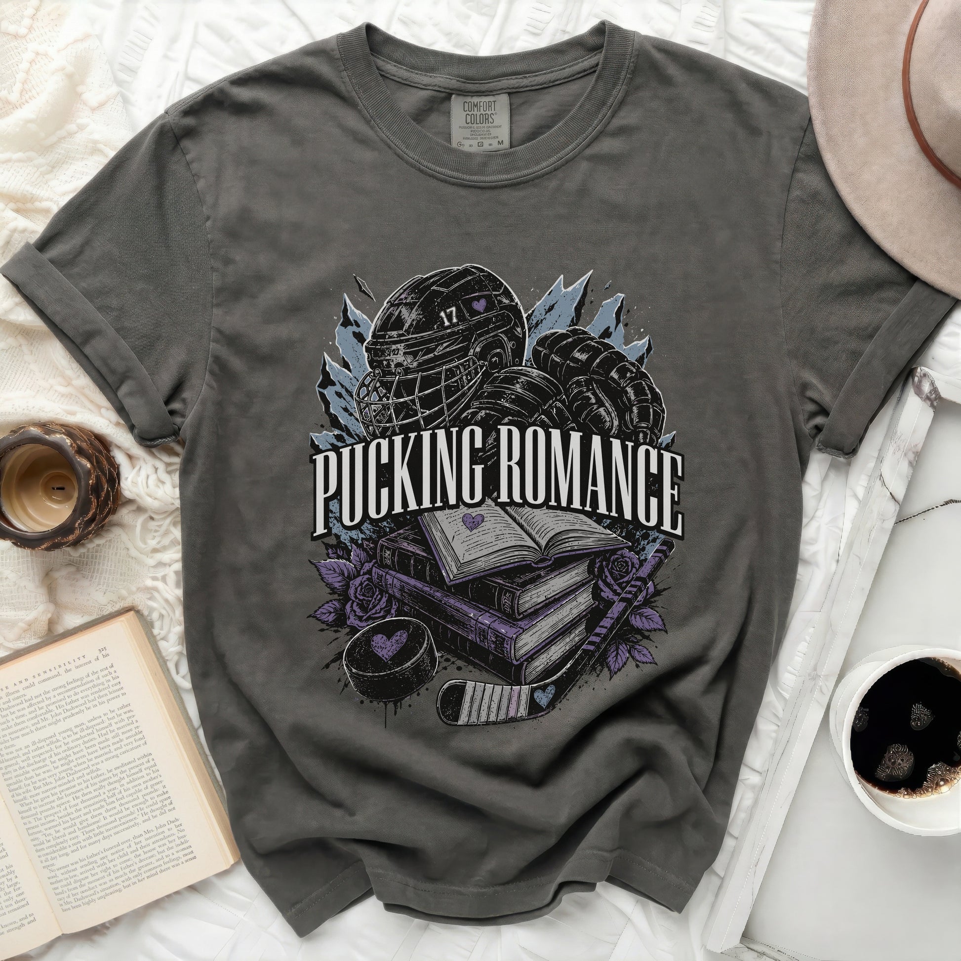 Dark grey t-shirt with "Pucking Romance" and hockey graphics.