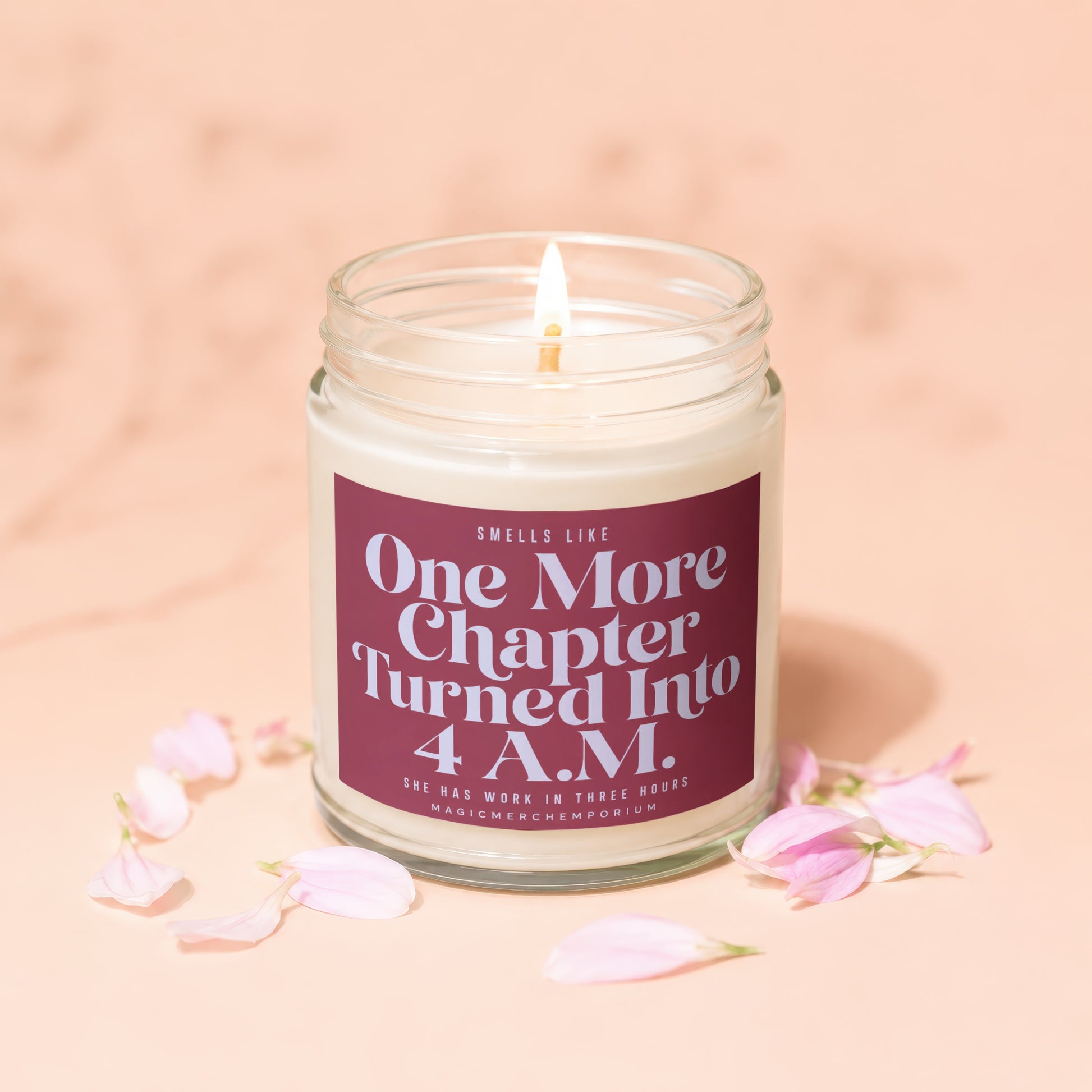 Candle with label "One More Chapter Turned Into 4 A.M." surrounded by petals.