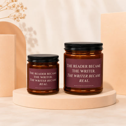 Two amber glass candles with black lids, one larger than the other, with text labels.