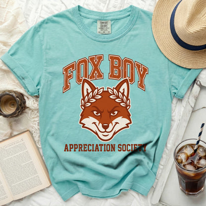 Teal t-shirt with "Fox Boy Appreciation Society" text and fox graphic.