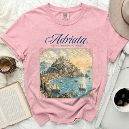 Pink t-shirt with "Adriata City of the Summer Court · Phyrian" text and vintage coastal castle art.