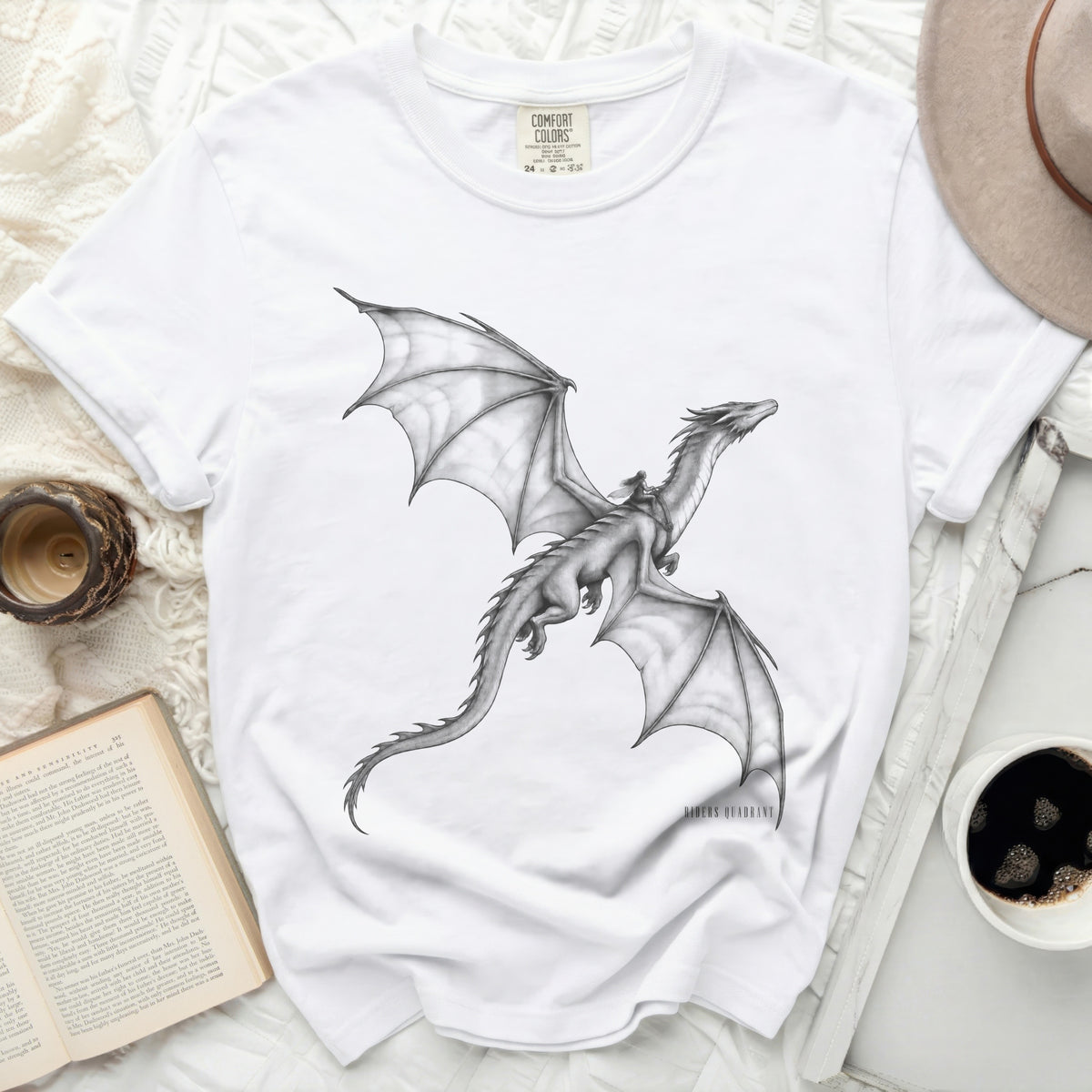 White Comfort Colors t-shirt with a black and white drawing of a winged dragon.