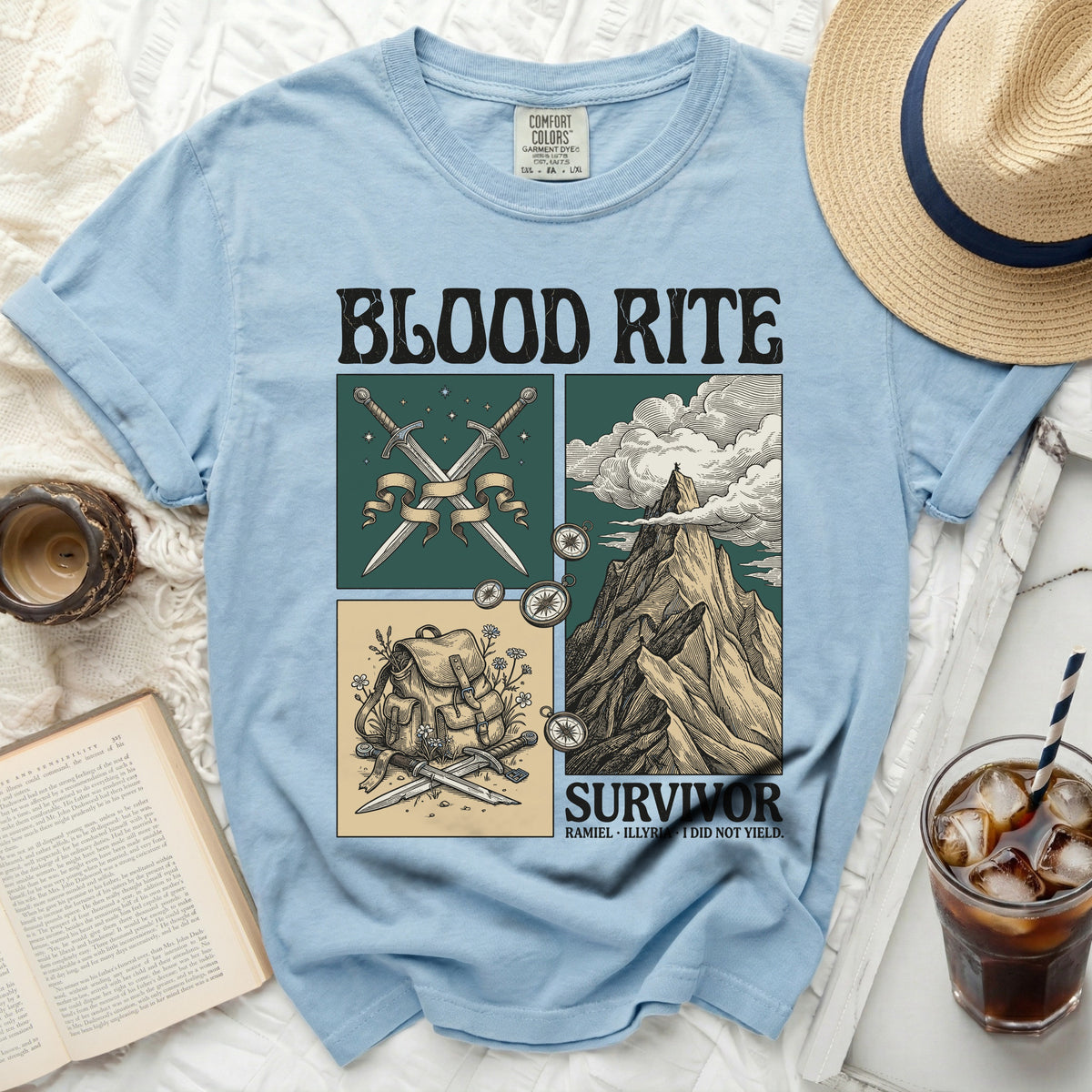 Light blue t-shirt with "BLOOD RITE" and "SURVIVOR" graphic art.