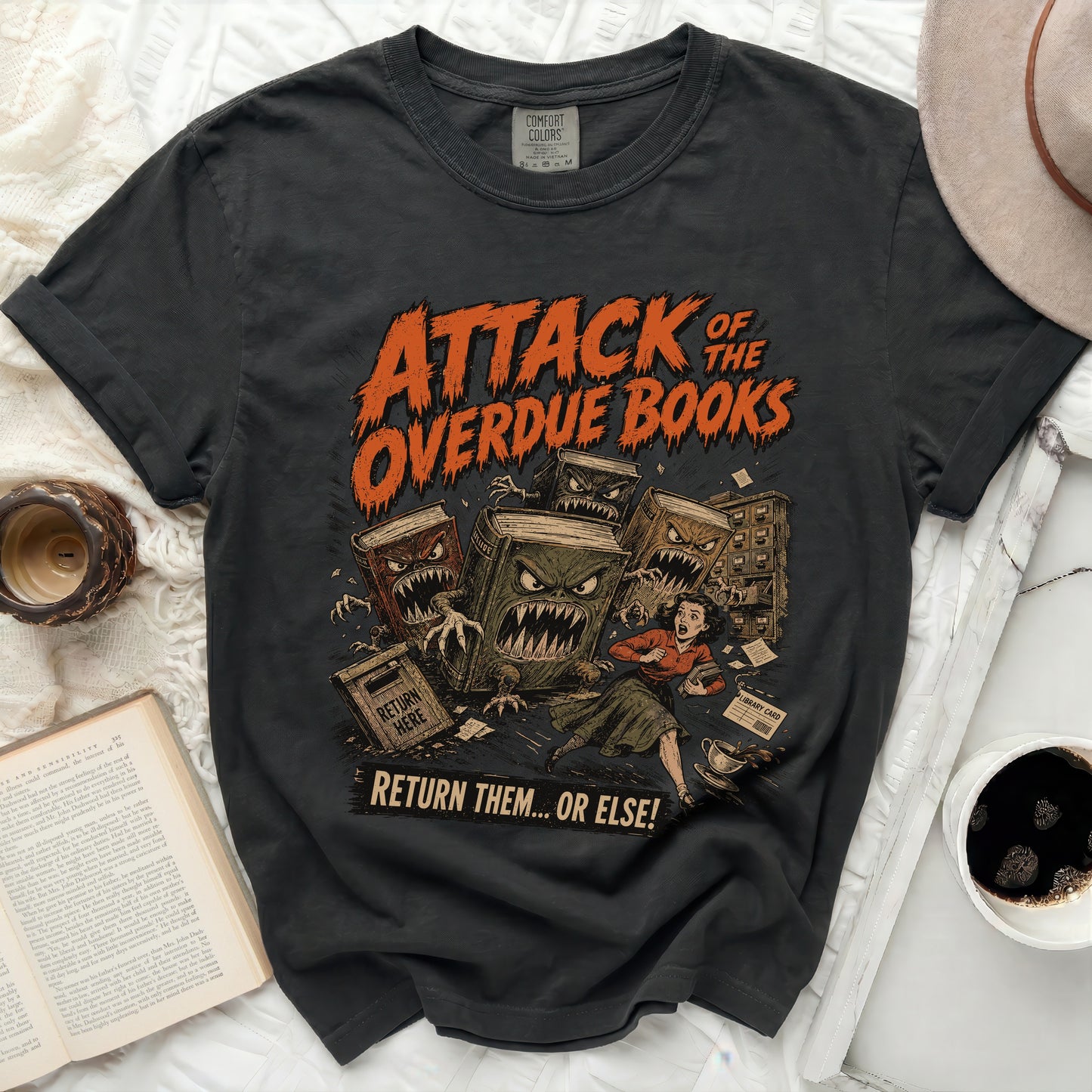 Attack of the Overdue Books graphic tee with vintage comic style.