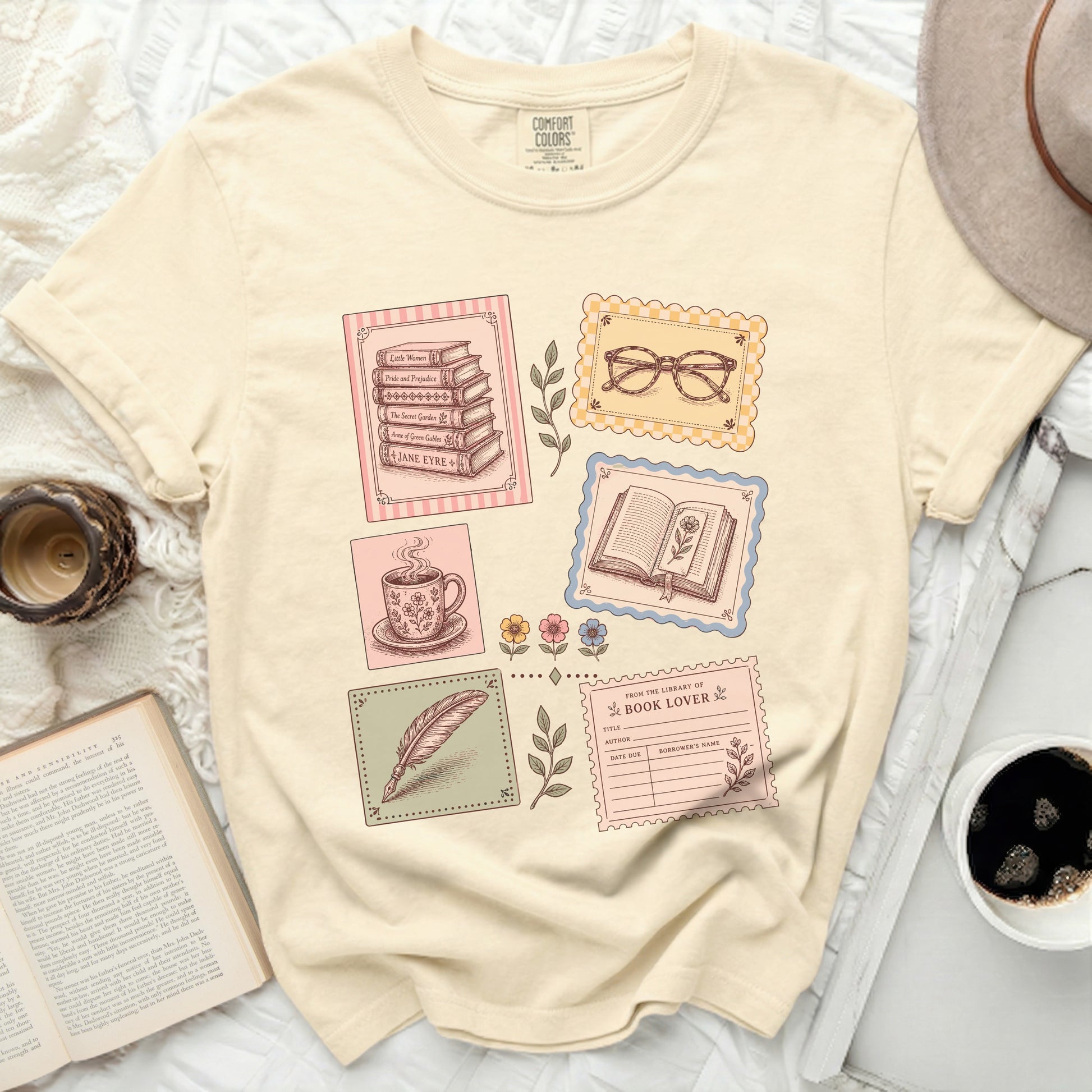 T-shirt with vintage book illustrations and library card graphic.