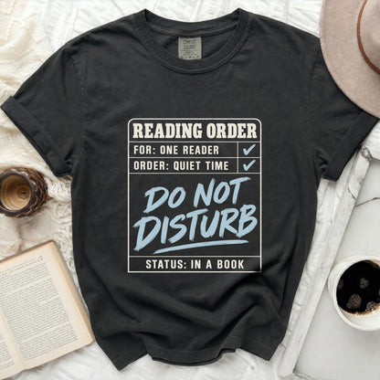T-shirt with "Reading Order: For: One Reader, Order: Quiet Time, Do Not Disturb, Status: In a Book" graphic.