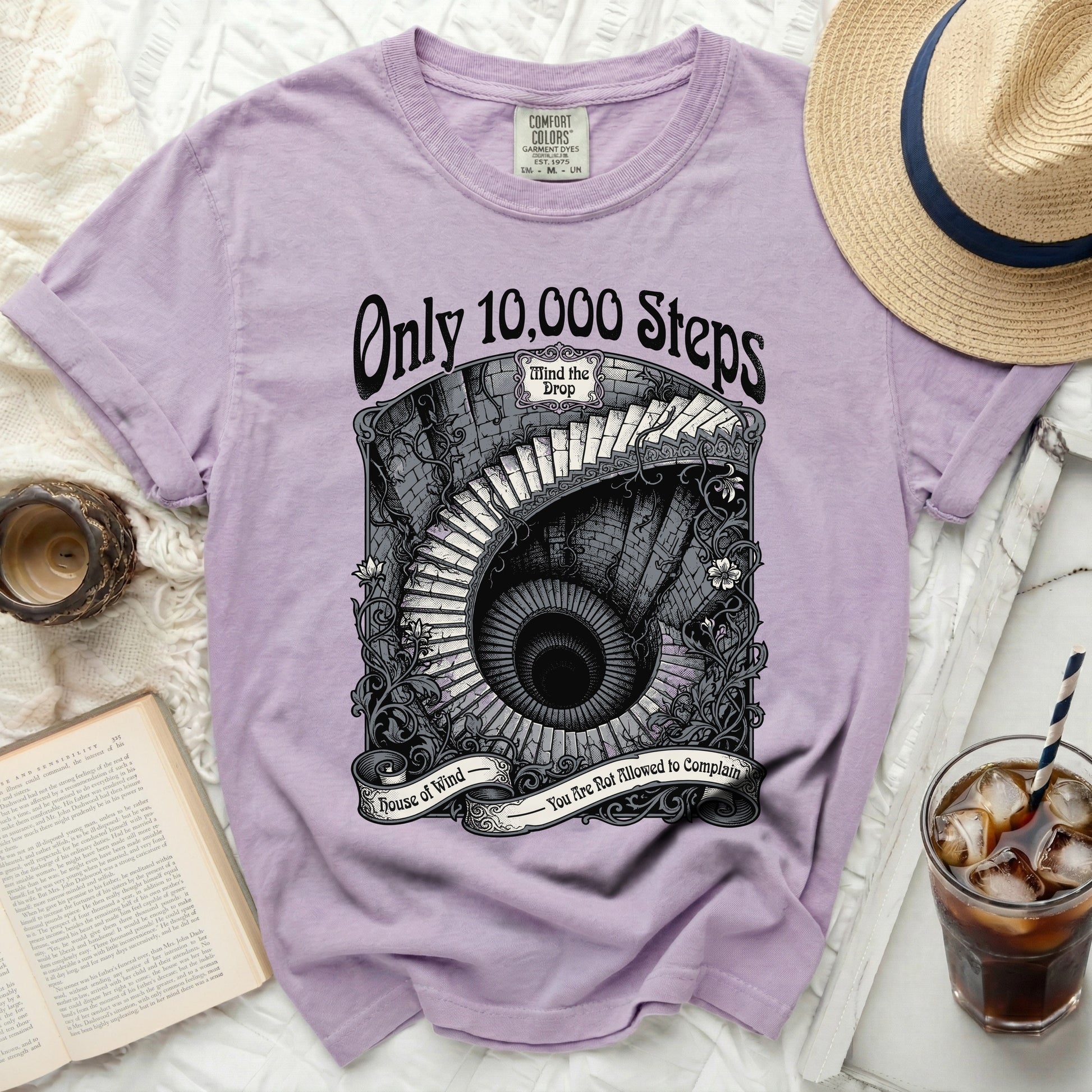 Lavender t-shirt with "Only 10,000 Steps" and a spiral staircase graphic.