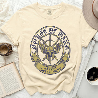 Cream t-shirt with "House of Wind Valkyrie Flight Academy" logo.