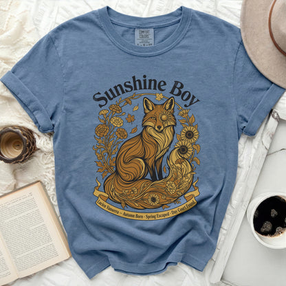Blue t-shirt with a golden fox and floral design, text "Sunshine Boy".