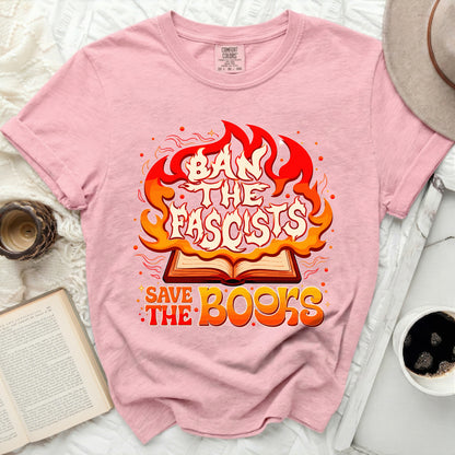 Pink t-shirt with "Ban the fascists save the books" graphic.