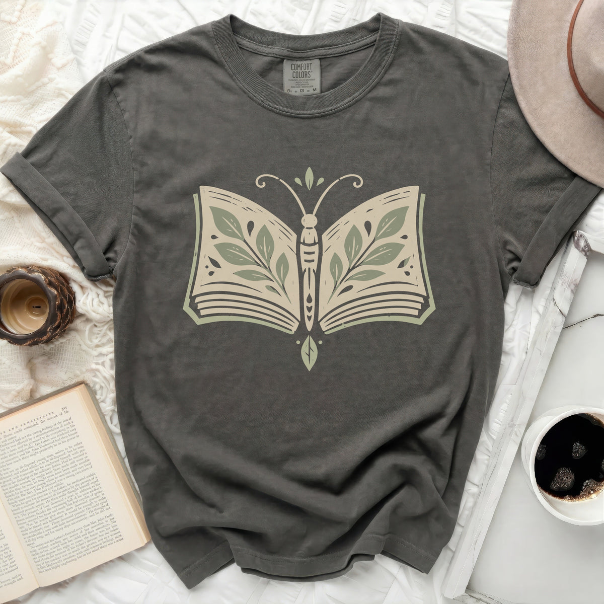 Dark grey t-shirt with a book-shaped butterfly graphic.