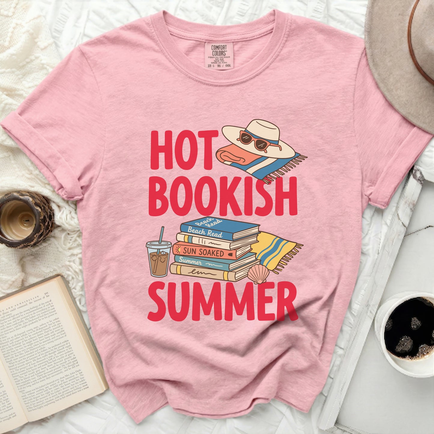 Pink t-shirt with "Hot Bookish Summer" text and beach scene graphics.