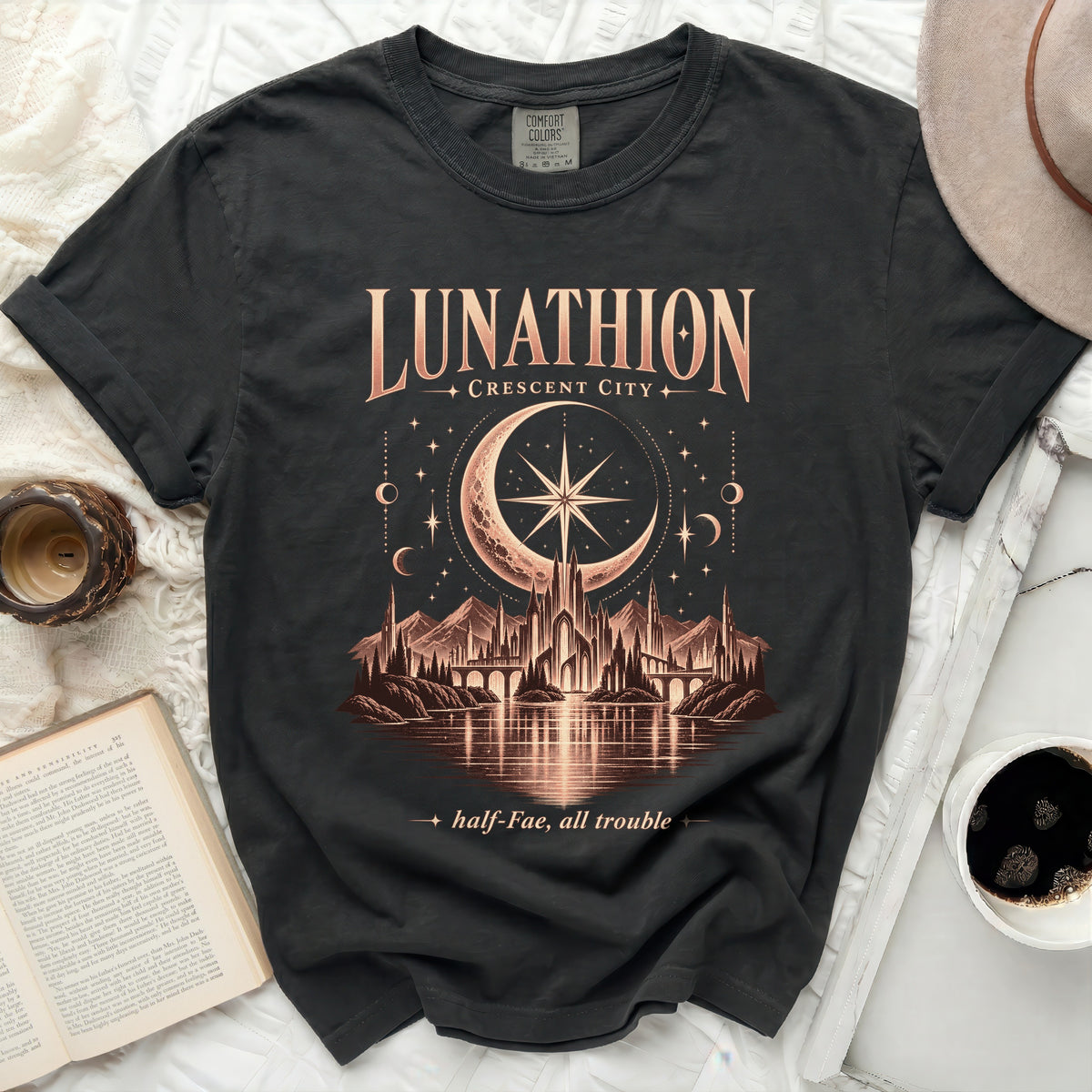 Black t-shirt with "LUNATHION CRESCENT CITY" and fantasy city graphic.
