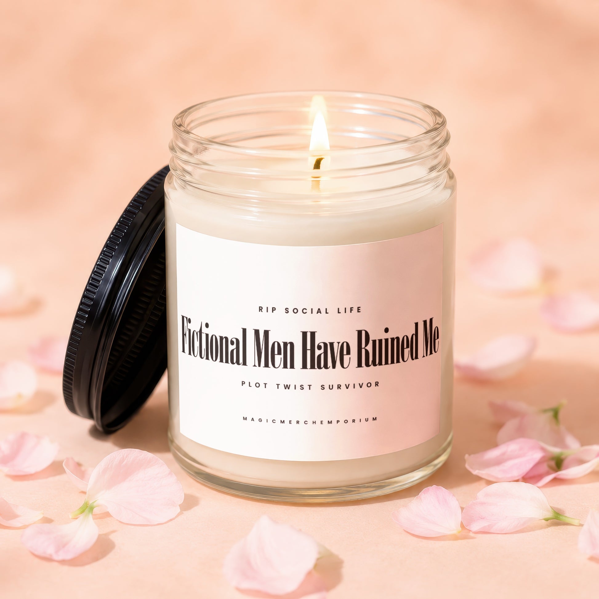 Lit candle in glass jar with black lid, "Fictional Men Have Ruined Me" text.