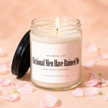 Lit candle in glass jar with black lid, "Fictional Men Have Ruined Me" text.