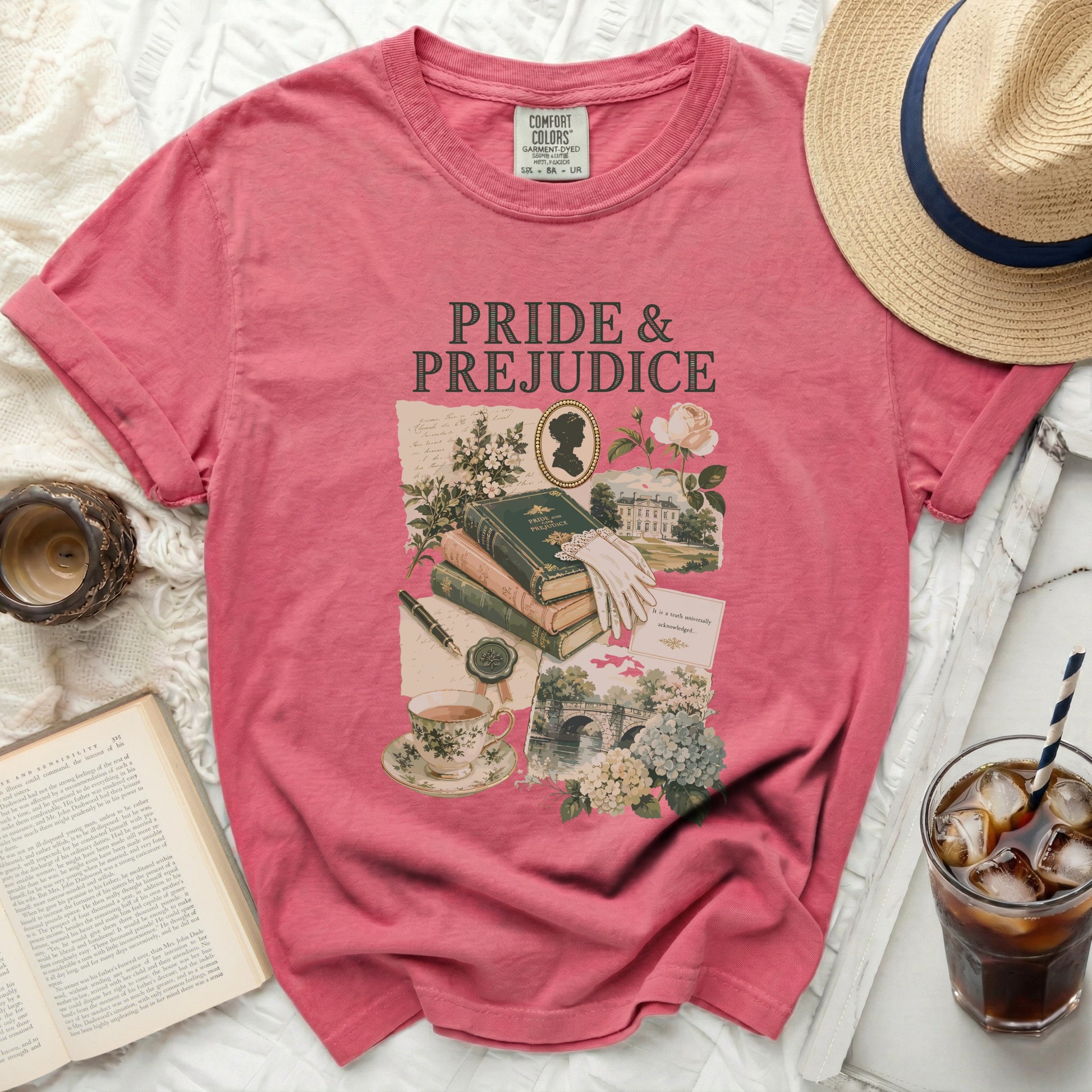 Pink t-shirt with Pride & Prejudice book, teacup, and floral illustrations.