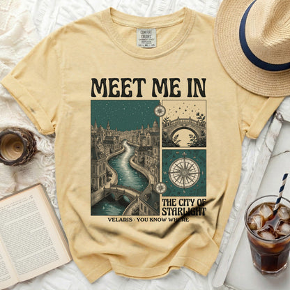 Yellow t-shirt with "Meet Me In Velaris, The City of Starlight" graphic.
