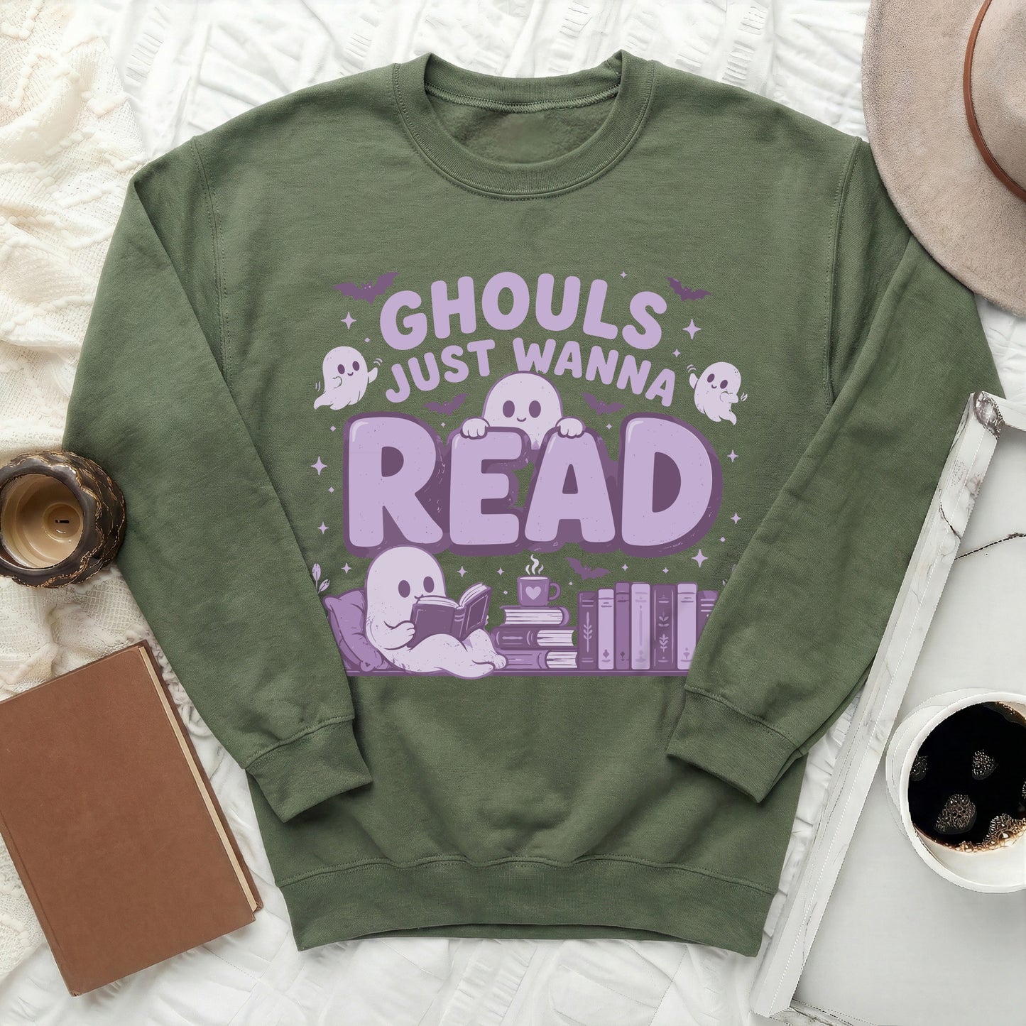 Green sweatshirt with "Ghouls Just Wanna Read" text and ghost graphic.