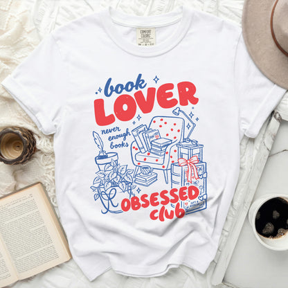 White t-shirt with "Book Lover Never Enough Books Obsessed Club" graphic.