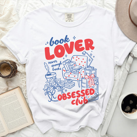 White t-shirt with "Book Lover Never Enough Books Obsessed Club" graphic.