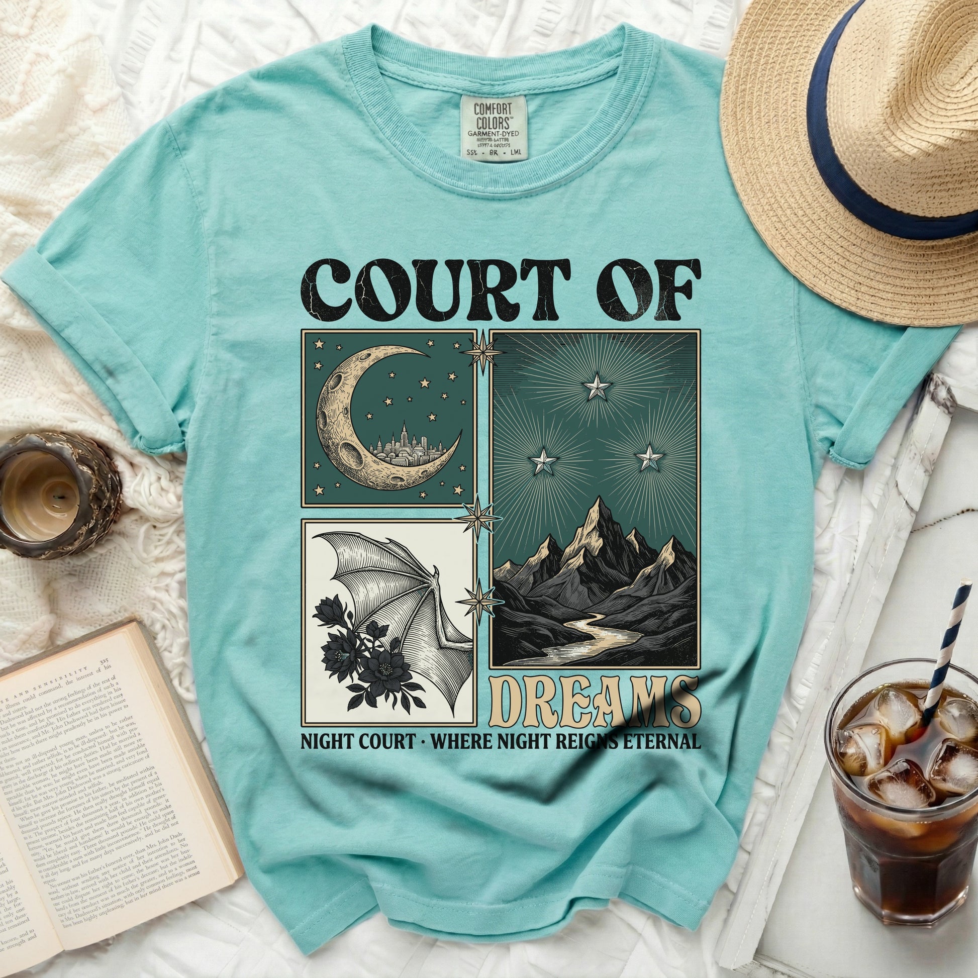 Teal t-shirt with "Court of Dreams Night Court Where Night Reigns Eternal" graphic.