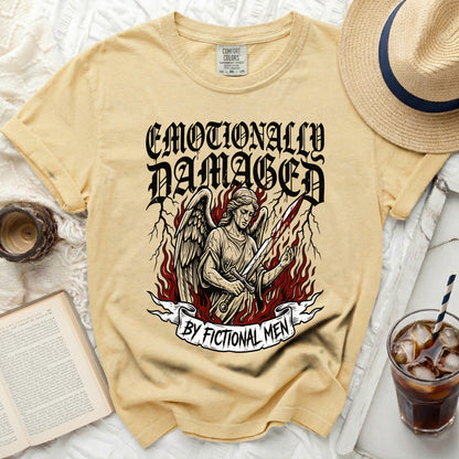 Yellow Comfort Colors t-shirt with "Emotionally Damaged By Fictional Men" graphic.