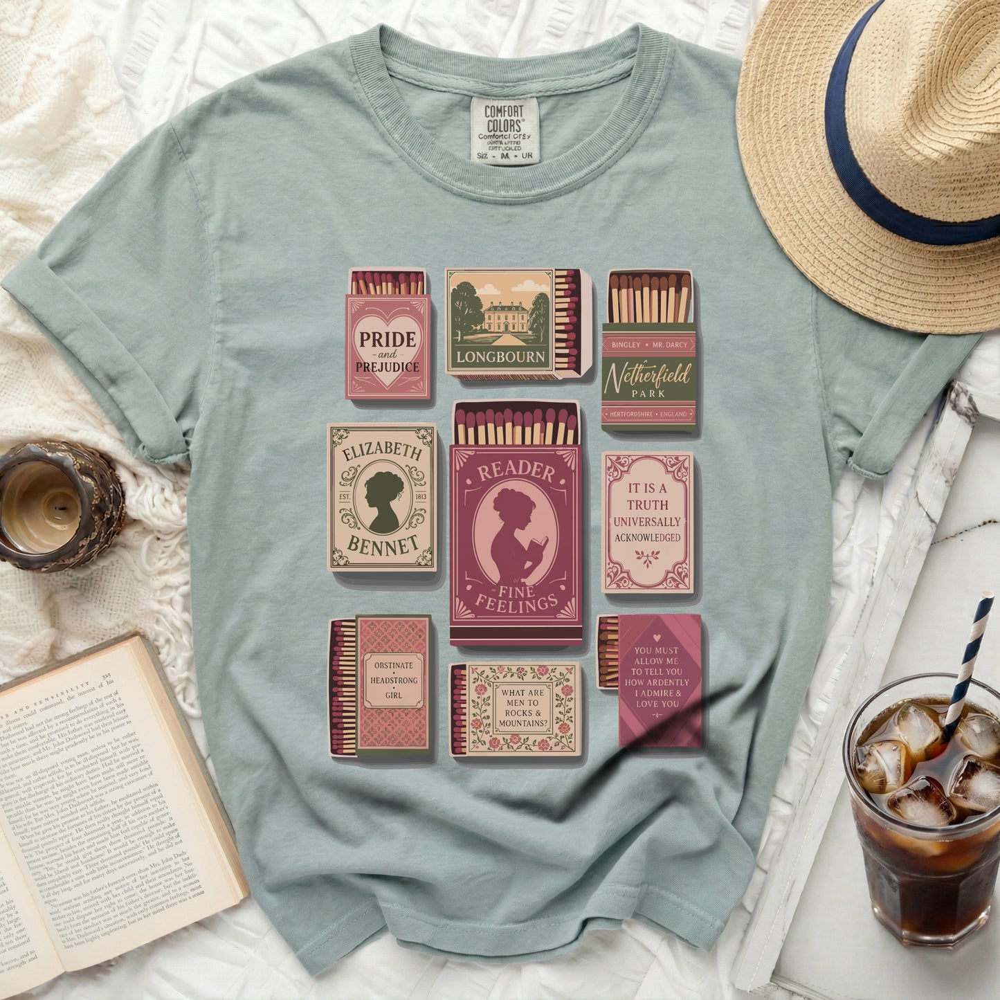 T-shirt with book-themed matchbox designs: Pride and Prejudice, Longbourn, Netherfield, Elizabeth Bennet.