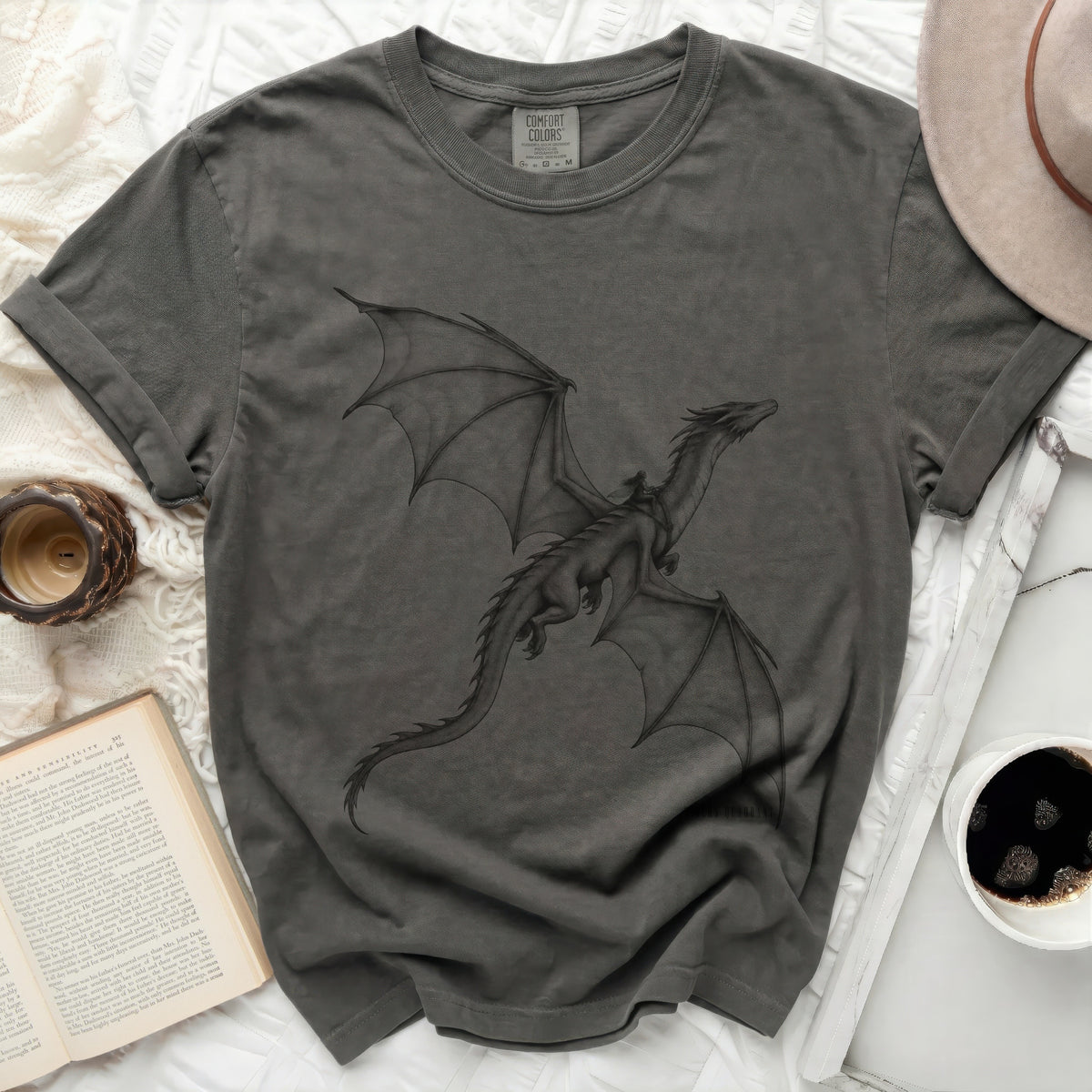 Charcoal grey t-shirt with a black line drawing of a dragon in flight.