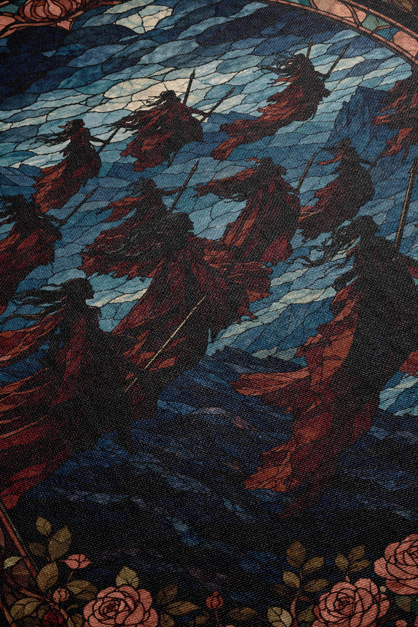 The image is a detailed and intricate painting featuring a group of people in red robes, with some of them holding swords, set against a backdrop of a dark blue sky with clouds. The painting is framed by a border of pink and red flowers, adding a touch of color and elegance to the overall composition.