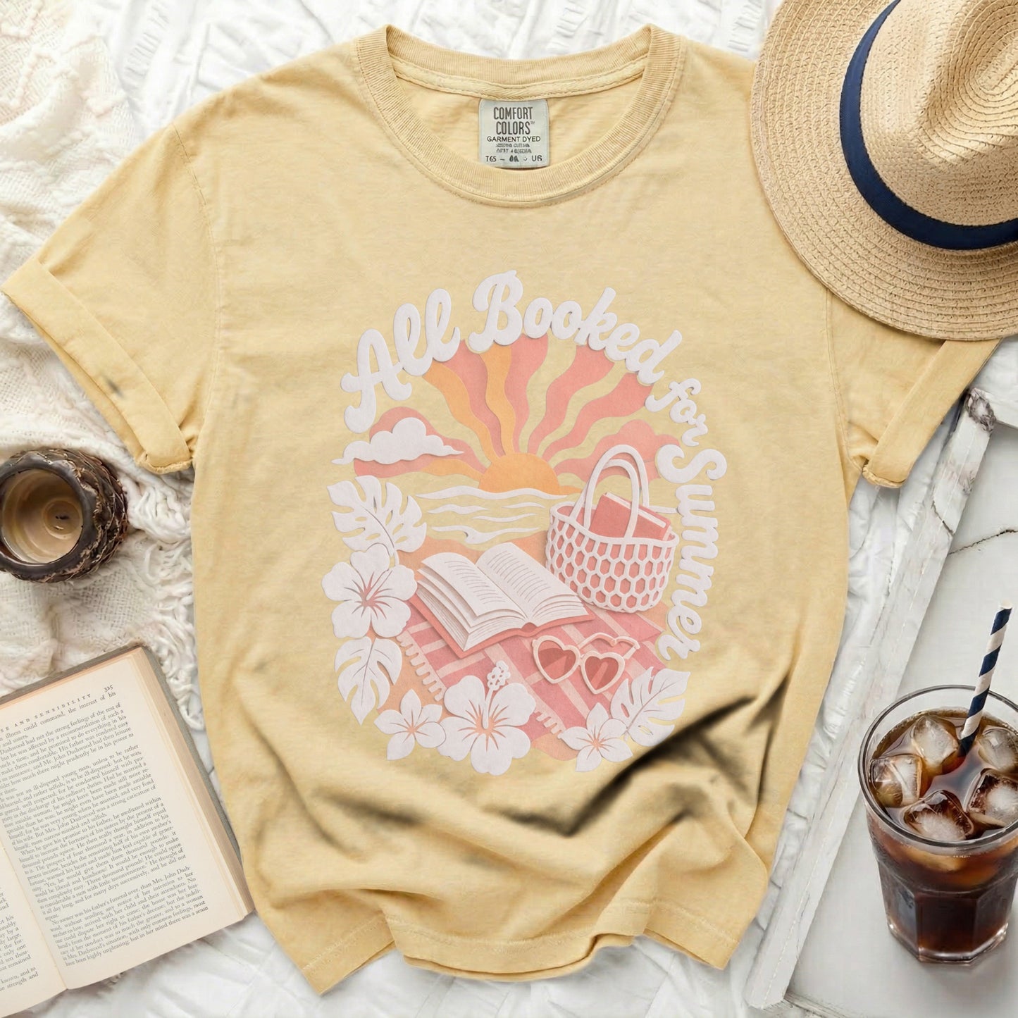 Yellow t-shirt with "All Booked for Summer" text and beach graphics.