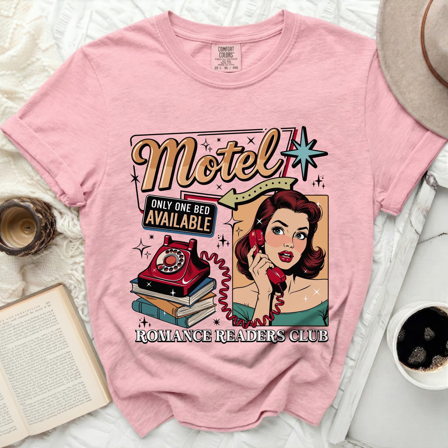 Pink t-shirt with "Motel Only One Bed Available" and "Romance Readers Club" graphic.